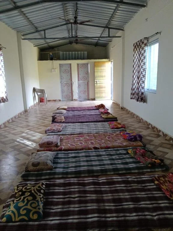 Mixed Dormitory · 8 futons at Raigad Agro Park, photographed on the property listing