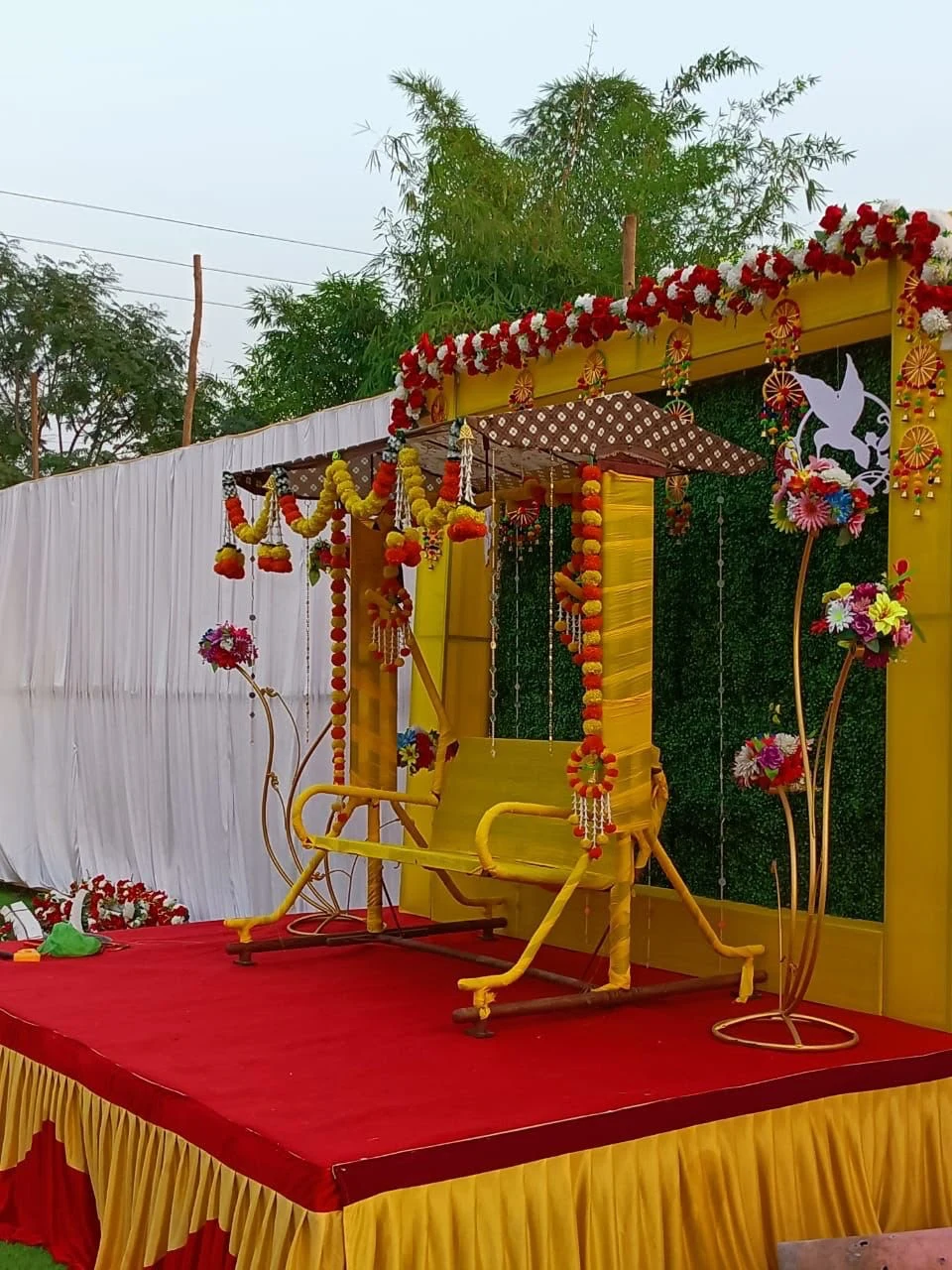 A flower-decorated swing at Raigad Agro Park