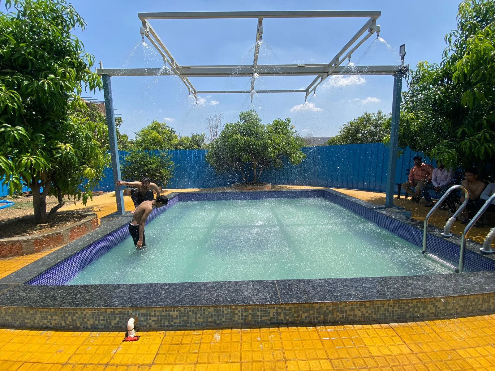 Outdoor swimming pool at Raigad Agro Park
